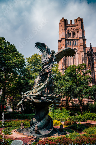 Fotografie, Obraz NEW YORK: statue near St.John cathedral the "Peace fountain"