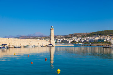 Wall Mural - Rethymno old Venetian harbor with the Egyptian lighthouse, Crete island, Greece. It was built in 1830 by Egyptians.