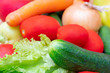 © sandipruel - Vegetables: lettuce, onions, tomatoes, cucumbers, onions, carrots, red sweet peppers.