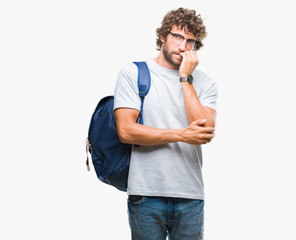 Sticker - Handsome hispanic student man wearing backpack and glasses over isolated background looking stressed and nervous with hands on mouth biting nails. Anxiety problem.