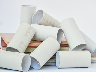 Finished Toilet paper rolls isolated on over white. Environmental protection concept. waste management concept.