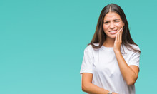 Young Beautiful Arab Woman Over Isolated Background Touching Mouth With Hand With Painful Expression Because Of Toothache Or Dental Illness On Teeth. Dentist Concept.