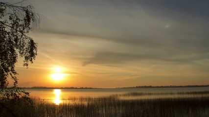 Wall Mural - Beautiful dawn over the lake, time lapse.
