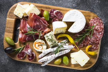 Sticker - Antipasto board with sliced meat, ham, salami, cheese, olives an