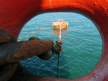 Offshore Oil Loading From Single Buoy Mooring Into Oil Tanker. Single Buoy Mooring Serves As Mooring Point For Tankers Loading And Offloading Gas And Liquids