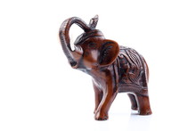 Brown Engraved Pattern Gold Elephant Made Of Resin Like Wooden Carving With White Ivory. Stand On White Background, Isolated, Art Model Thai Crafts, For Decoration Like In The Spa.