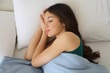 © zigres - Young beautiful woman sleeping in her bed and relaxing in the morning