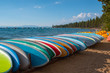 Paddle boards lined up on the beach at Zephyr Cove in Lake Tahoe