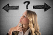 © alphaspirit - Confused businesswoman must choose the right way