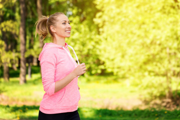 Wall Mural - fitness woman training and jogging in summer park
