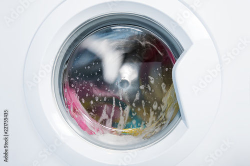 Fotografía Process of cleaning color cloth in washing machine