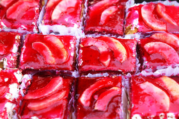 Cake with peach slices and red jelly