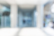 © weedezign - Blur background of businessman walking at corridor in convention hall, business office building hall way background.