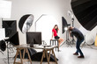 © Bangkok Click Studio - Photographer and pretty model working in modern lighting studio with many kinds of flash and accessories.