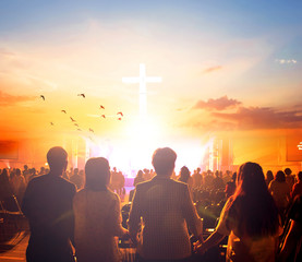 Wall Mural - Worship concept:Silhouette people looking for the cross on  sunrise background