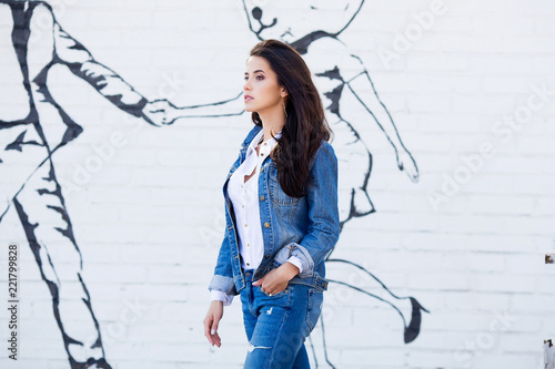 girl wearing shirt and jeans