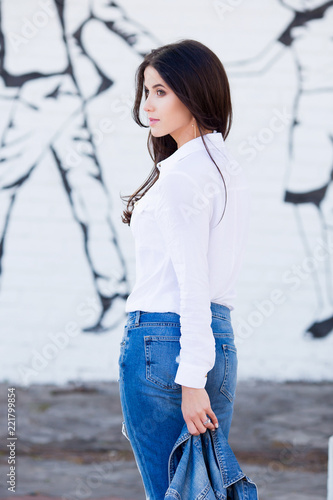 girl with white shirt and jeans
