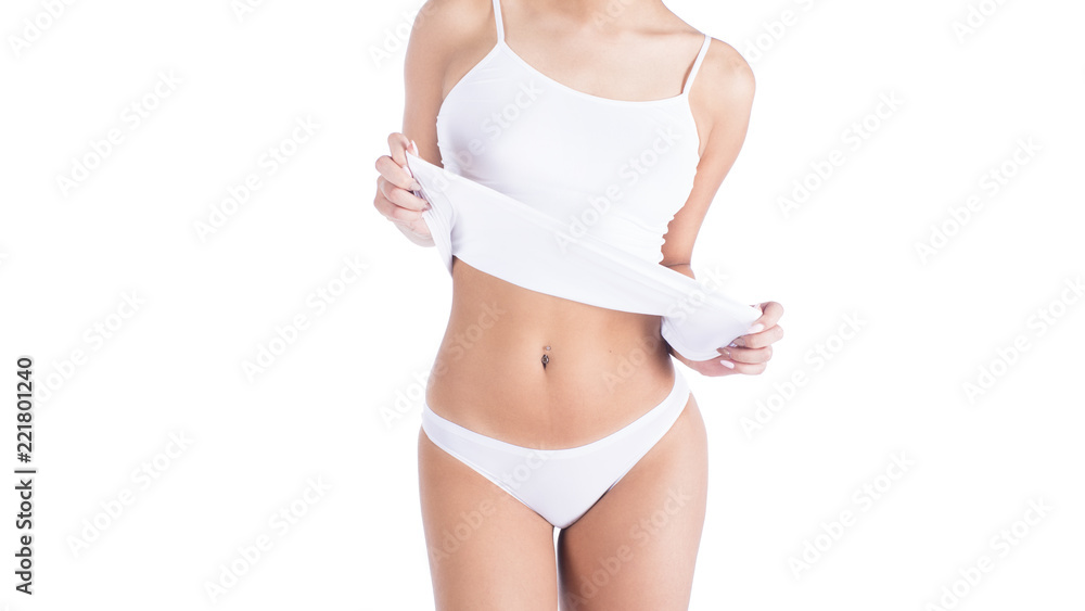 Close-up of a young woman in white underwear isolated on white background. - obrazy, fototapety, plakaty 