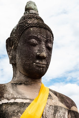 Canvas Print - Ancient stone Buddha statue at Ayutthaya Historical Park.