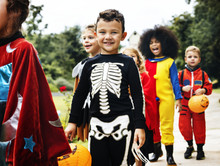 Young Kids Trick Or Treating During Halloween