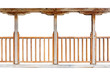 A wooden railing of a balcony with wooden columns isolated on white background