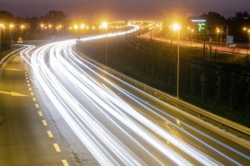 Wall Mural -  light trails on motorway highway at night, long exposure