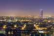 Beautiful Paris night cityscape seen from Montmartre with the tour Montparnasse skyscraper at night
