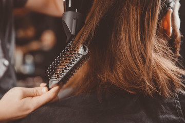 Wall Mural - Hairdresser for men barber shop. Process of grooming long hair.