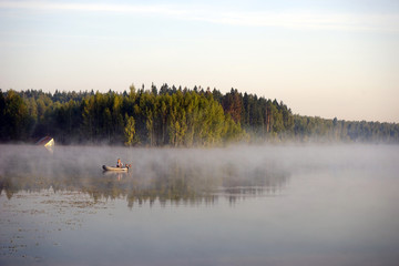 Wall Mural - Fisherman on the lake