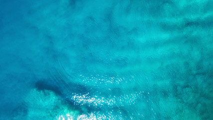 Wall Mural - aerial view at the sea. turquoise water from air as a background from air. natural seascape at the s