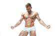 © satyrenko - bodybuilder posing. Beautiful sporty guy male power. Fitness muscled manin white lingerie. on isolated white background.