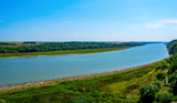 Fototapeta Krajobraz - Photo of big river in Khotyn, view from beach