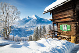 Fototapeta Do pokoju - Traditional mountain cabin in the Alps in winter