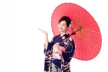 Wall Mural - portrait of young asian woman wearing purple kimono on white background