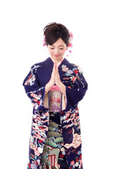 Wall Mural - portrait of young asian woman wearing purple kimono on white background