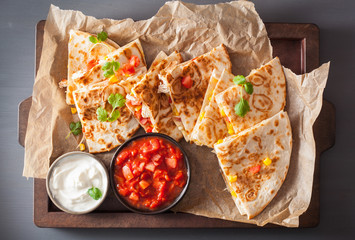 Wall Mural - mexican quesadilla with chicken, tomato, sweet corn and cheese