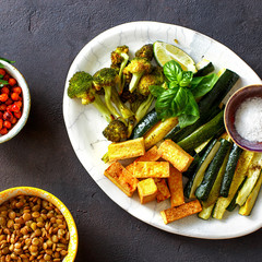 Poster - Healthy Vegetarian Food Baked vegetables roasted tofu cheese top view