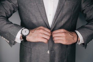 Wall Mural - Suited man posing.Perfect to the last detail. Handsome young businessman .business and office concept - handsome businessman. Toned.