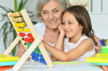 Portrait of little girl and her grandmother