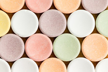Close Up View Of Circular Vitamins Or Tablets