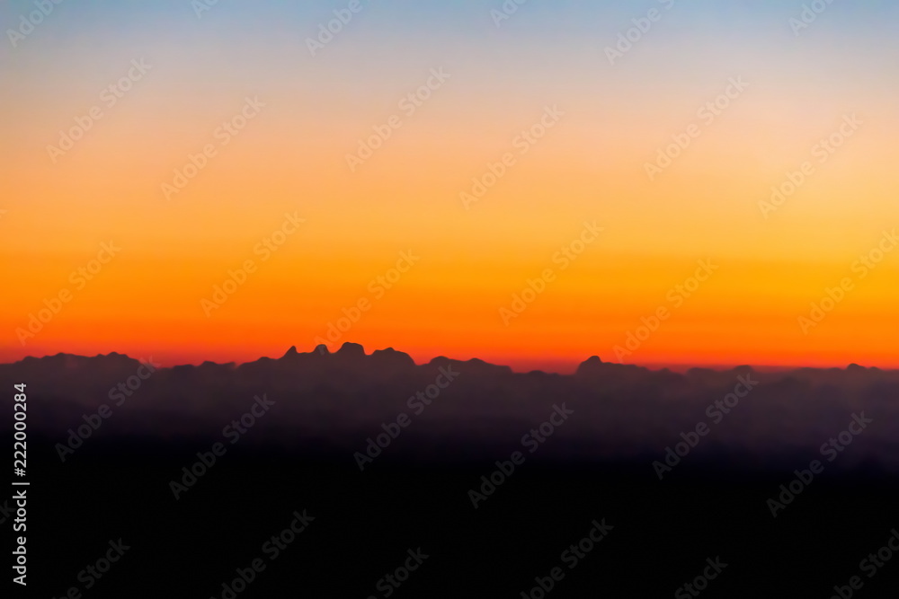Horizon line of orange sky and clouds , beautiful golden orange sunset ...