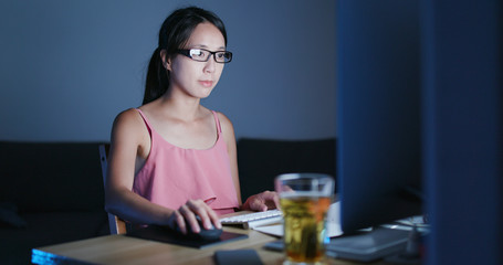 Sticker - Woman working on computer at night and feeling eye dry