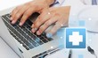 © BillionPhotos.com - Close-up Doctor at hospital working with tablet