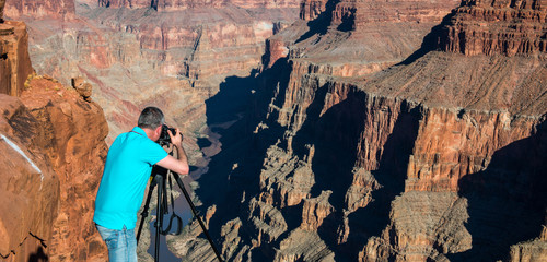 Wall Mural - Photographer in Grand Canyon, Arizona