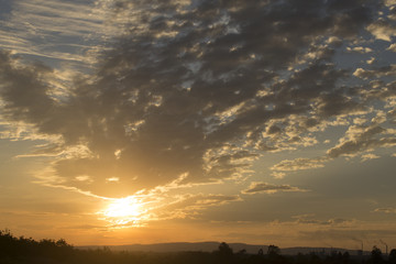 Sunset or sunrise overcast sky.