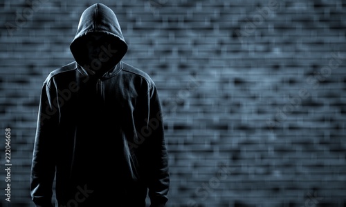 Cuadros en Lienzo Thief in black clothes on grey background