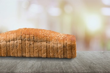 Canvas Print - tasty sliced bread on background