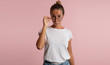 © South House Studio - young Woman Looking Over Her Glasses