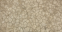 Dry Soil And Cracked Earth Background Texture.