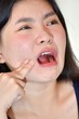 © dtiberio - Pretty Chinese Woman With Toothache